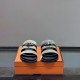 Hermes Jackson Vert Toundra Suede Slide Sandals Front View in silver Front view of Hermes Jackson vert toundra suede slide sandals displaying double straps in silver