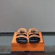 Hermes Jackson Brown Suede Sandals Front View in brown and silver Frontal view of Hermes Jackson brown suede sandals displaying the metal buckle details in brown and silver