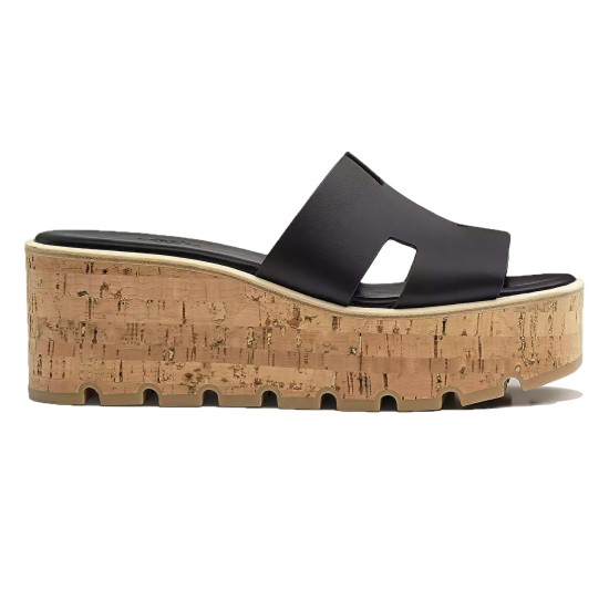 Hermes Eze Black Platform Sandal Side Profile Side profile view of the black leather wedge sandal showing the thick cork platform sole
