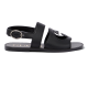Gucci Black Leather Sandals Side Profile Side profile view of Gucci black leather sandals showing ankle strap and buckle