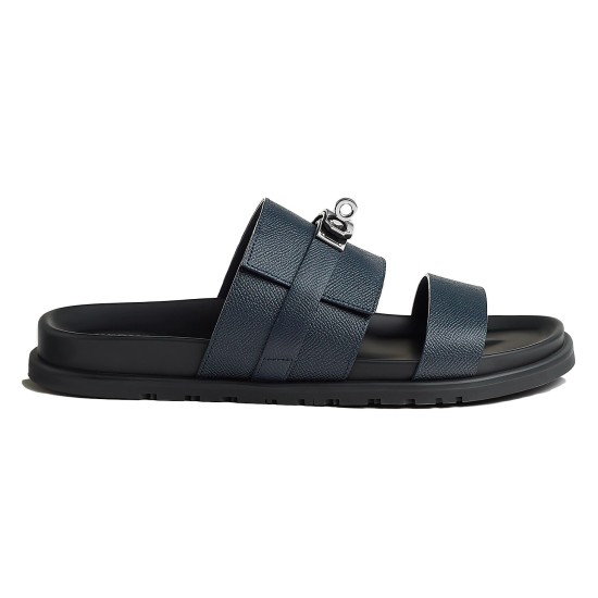 Hermes Jackson Sandals side profile in blue leather Side profile view of the blue Hermes Jackson Sandals showing the contoured sole and double strap design