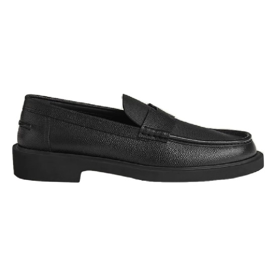Hermes Men's Guillaume Black Loafers Side Profile Side view of Hermes Men's Guillaume Textured Leather Loafers In Black showing rubber sole and textured upper