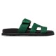 Hermes Chypre Suede Sandals In Dark Green - Outer Profile View Hermes Chypre suede sandals in dark green viewed from the outer side profile