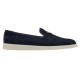 Side profile view of Prada Men's blue suede calf leather slip-on loafers featuring a white sole