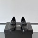 Dolce & Gabbana Men's Black Patent Loafers Front Detail Dolce & Gabbana Men's Black Polished Patent Calfskin Loafers front view showing DG hardware