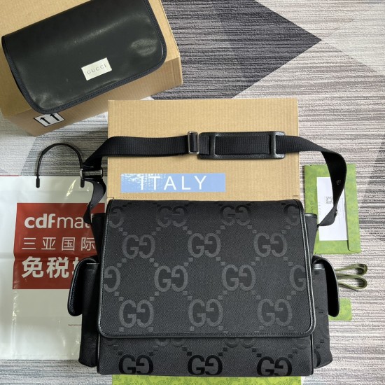 Gucci Men's Men Jumbo Gg Baby Changing Bag In Black Uk set layout Men's Overhead layout showing the black baby bag alongside its matching changing pad and packaging