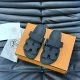 Hermes Chypre black leather sandals top layout Top-down view displaying the dual strap configuration of Hermes Chypre black leather sandals