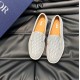 Top-down pair view of Dior Men's Granville Grey Suede Patterned Loafers displaying the patterned vamp and tan leather lining in grey and white