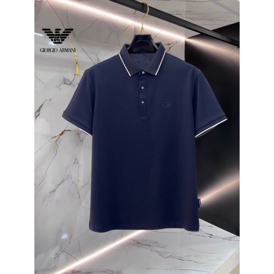 Front view of the navy blue Armani men's polo shirt with white tipping on the collar and sleeves