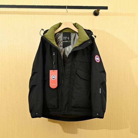 Canada Goose Men's Black Hooded Utility Coat With Olive Lining displayed on a wooden hanger
