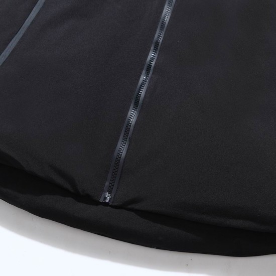 Men's Close-up of the front hem and zip fastening on the black coat in black and white