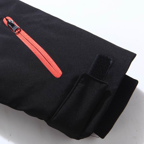 Men's Close-up of the sleeve cuff showing velcro fastening and red zipped pocket in black and white