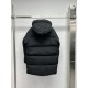 Canada Goose men's hooded puffer coat in navy and black hanging side by side