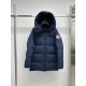 Hanging front view of Canada Goose men's navy hooded puffer coat