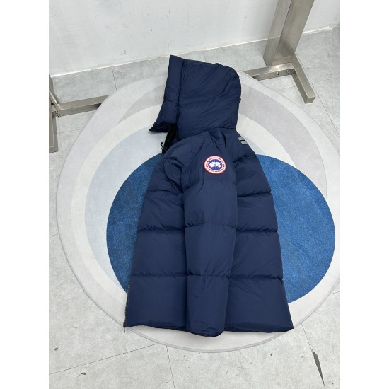 Flat lay view of Canada Goose men's navy hooded puffer coat