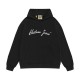 Front view of Gallery Dept black script print crossover hooded sweatshirt featuring white chest graphic and kangaroo pocket