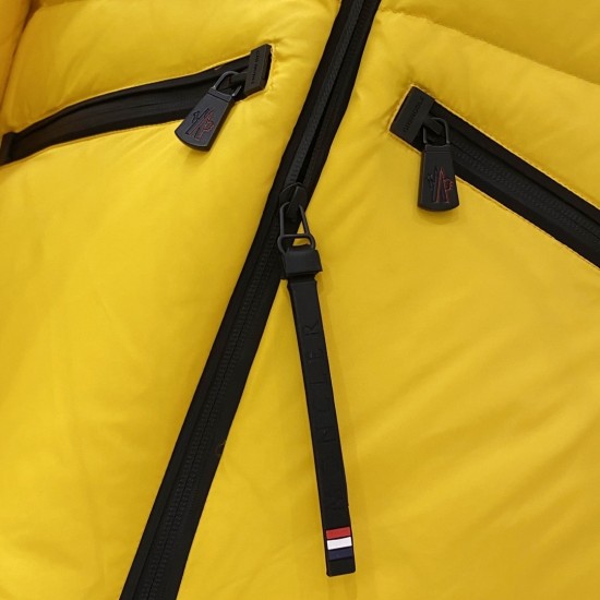 Moncler Men's Pocket Zipper Hardware Detail Macro view of Moncler Men's pocket zipper hardware and pullers