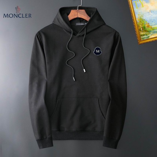 Moncler Black Drawstring Hooded Sweatshirt Front View Front view of Moncler black drawstring hooded sweatshirt with chest patch emblem