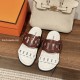 Hermes Sandals Overhead View in White and Red Marsala Hermes sandals in white and red marsala overhead angle view