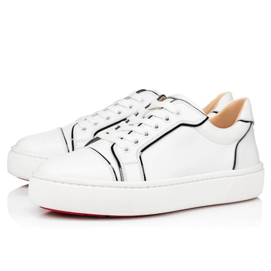 Front side perspective view of Christian Louboutin Vieirissima white leather low top trainers with black trim