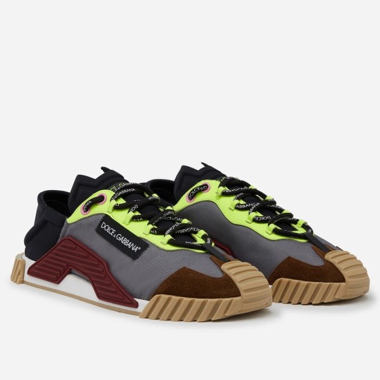 Dolce & Gabbana Low-Top Mesh Trainers Pair View in grey and yellow Pair of Dolce & Gabbana grey mesh trainers with yellow and brown accents in three-quarter view