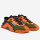 Pair of Dolce & Gabbana mesh slip-on low-top trainers in orange and green shown from a front three-quarter angle