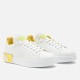 Dolce & Gabbana Portofino Trainers Front View in white and yellow Front perspective view of Dolce & Gabbana white leather Portofino trainers with yellow accents