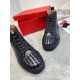 Christian Louboutin Men's Black Spiked High-Top Sneakers Toe Cap Detail Top-down view of the spiked toe caps on Christian Louboutin Men's Black Leather High-Top Sneakers