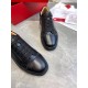 Christian Louboutin Louis Junior Flat Black Leather Toe View Top-down view focusing on the lace-up closure and cap toe of Christian Louboutin Louis Junior Flat black trainers