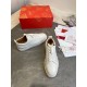 Christian Louboutin Louis Junior Flat White Trainers Set View Overhead layout of Christian Louboutin Louis Junior Flat white trainers with luxury dust bag