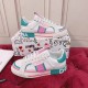 Dolce & Gabbana Custom 2.Zero Trainers Dual Side View in white and green Opposing side views of Dolce & Gabbana Custom 2.Zero white green pink trainers