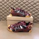 Dolce & Gabbana Bordeaux Red Fabric Trainers - Display Pair Pair of bordeaux red Dolce & Gabbana fabric trainers displayed on top of a shoebox