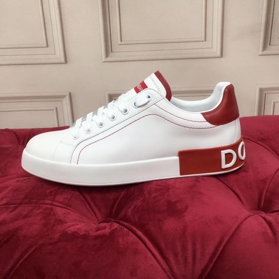 Dolce & Gabbana Portofino Trainer Full Profile View in white and red Full lateral profile of a single Dolce & Gabbana white leather trainer with red heel clip