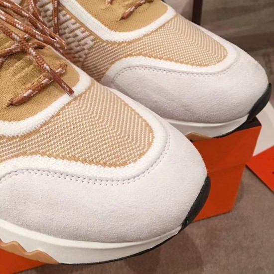 Hermes Addict Knit Trainers Toe Box Detail in beige and white Close-up of the white suede toe cap and patterned knit toe box on Hermes Addict Knit Trainers in beige and white