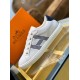 Hermes Avantage Leather Trainers Display View in white and blue Side view of white leather trainer resting beside orange brand box in white and blue