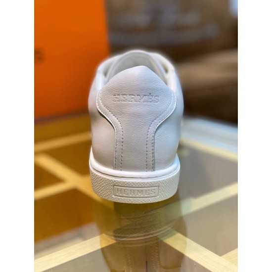 Rear view highlighting embossed brand detail on heel counter and sole in white