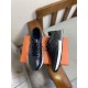 Hermes Drive Leather Low Top Trainers Black Pair View in black and white Pair of Hermes Drive Leather Low Top Trainers Black displayed together showing front and lateral details in black and white