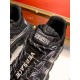 Versace Trigreca Black Trainer Tongue Detail Close-up detail of the padded tongue, laces, and Trigreca logo patch on a black trainer