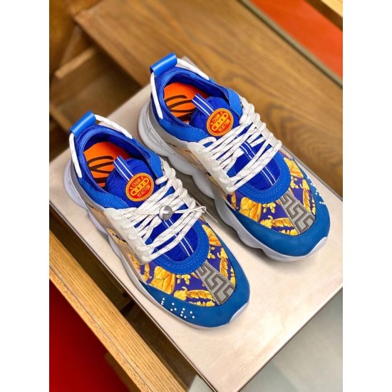 Top-down view of Versace Chain Reaction trainers showcasing blue overlays, baroque print and white laces in blue and yellow