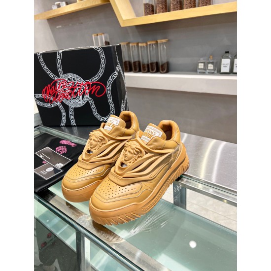 High angle view of Versace Odissea brown leather footwear on display