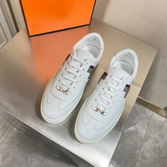 Hermes Boomerang Trainers Overhead View in white and multicoloured Top-down overhead view of a pair of white low top leather trainers in white and multicoloured