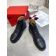 Christian Louboutin Men's Black Spiked High-Top Sneakers Pair Display Pair of Christian Louboutin Men's Black Leather Spiked High-Top Sneakers displayed together with packaging