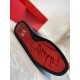 Christian Louboutin Louis Junior Flat Red Sole Detail in black Full view of the iconic red rubber outsole with embossed signature script on Christian Louboutin Louis Junior Flat trainer in black