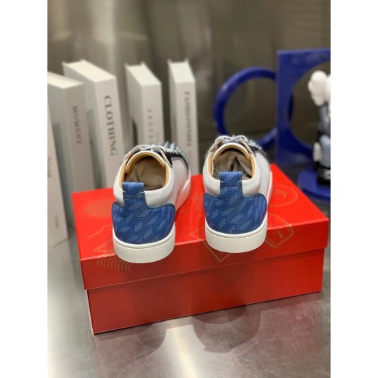 Christian Louboutin Louis Junior Spikes Orlato Heel View in white and blue Rear view of Christian Louboutin Louis Junior Spikes Orlato trainers highlighting blue patterned heel panels and pull tabs in white and blue