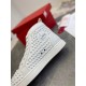 Christian Louboutin Louis Spikes Flat white leather trainer side panel logo badge close-up