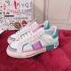 Dolce & Gabbana Custom 2.Zero Trainers Profile in white and green Three-quarter side angle of Dolce & Gabbana Custom 2.Zero trainers on red surface in white and green