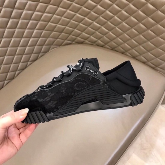 Dolce & Gabbana Black Lace Low Top Slip On Trainers Medial Side Dolce & Gabbana Black Lace Low Top Slip On Trainers medial side view held in hand