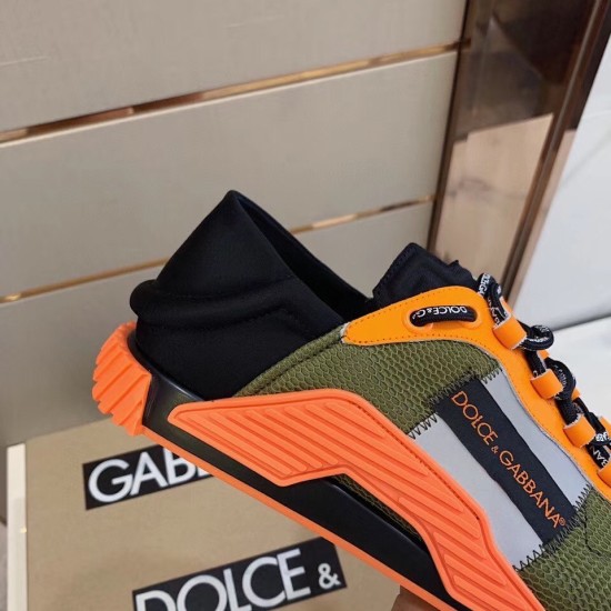 Close-up of the lateral side panel on the Dolce & Gabbana orange and green trainer with branded logo band