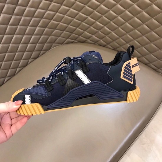 Medial Profile Dolce & Gabbana Blue Trainer Medial side view of Dolce & Gabbana blue fabric trainer showing heel clip detail