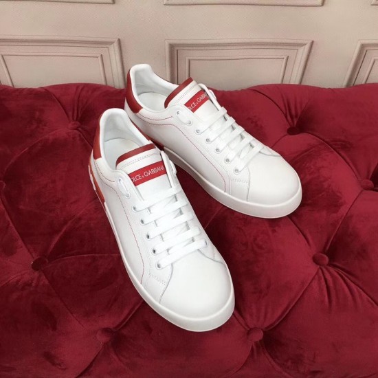 Dolce & Gabbana Portofino Trainers Pair View in white and red Overhead pair view of Dolce & Gabbana white leather trainers with red stitched outlines